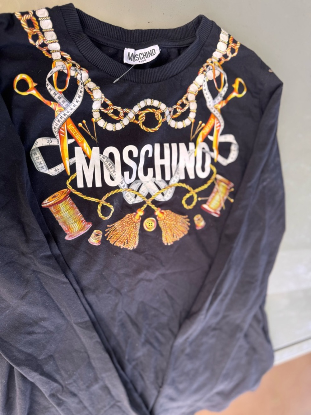 Moschino Black Sweatshirt with Gold and White Chain Graphic